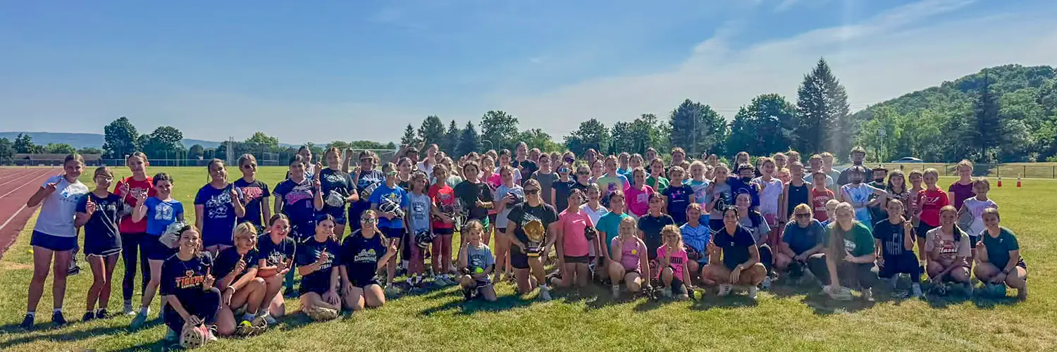 group photo of the softball camp participants